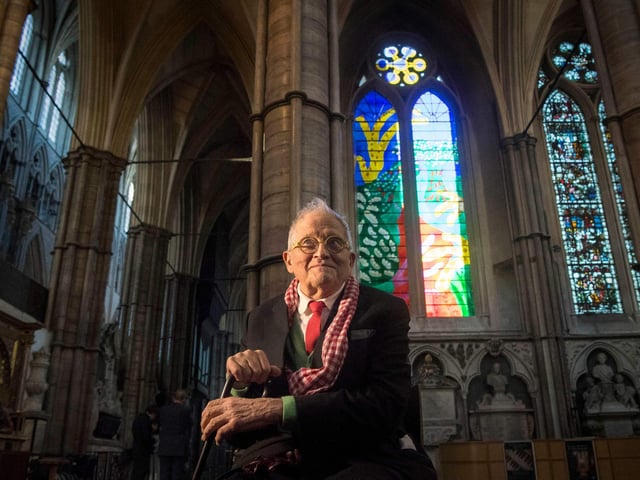 David Hockney in front of The Queen's Window, a new stained glass window at Westminster Abbey