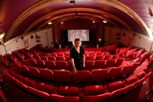 Wendy Cook, who is heading up the operation, in the freshly renovated screening room.
