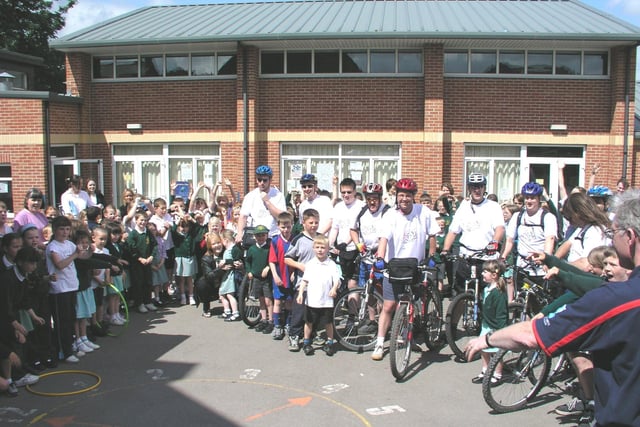 A team of parents from St Joseph's Catholic Primary School pedalled along Leeds-Liverpool Canal to raise cash for school ICT suite. The fundraiser was  organised by The Friends of St Joseph's Catholic Primary. Pictured in June 2003.