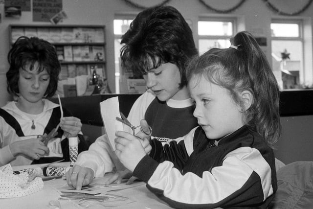 Making calendars at Town End Farm library in 1988 were Helen Dodds, Deanna Rogerson, and Lucy Dodds.