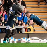 Harry Newman scores for Leeds Rhinos against Huddersfield Giants. Here's how the Leeds players rated.
