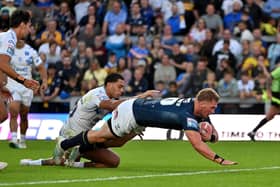 Tom Holroyd scores a try for Leeds Rhinos against Toulouse Olympique. Picture by Matthew Merrick/SWpix.com.
