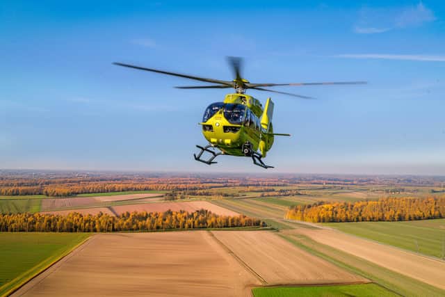 One of the charity's helicopters in flight. Photo: John Gardner