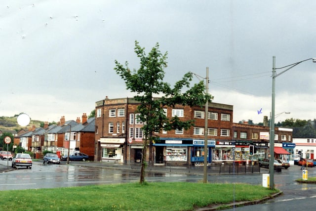 The junction of Selby Road and Dunhill Rise in Halton in October 1985. Shops in view include Wray's Hardware and DIY, Hair Express, a wool shop and a chemist.