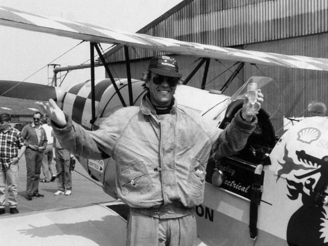 Lone pilot Tony Smith, who flew half way around the world in a 50 year old Bucker Jungmann biplane, arrived at Sherburn-in-Elmet in May 1989 not quite the man he was. The 43-year-old touched down two stones lighter after the 12,000 mile journey took him through some of the world's hot spots.