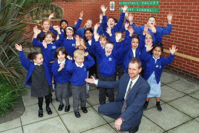 This is headteacher Stuart Myers of Kirkstall Primary with some of his pupils. They were celebrating in November 1999 after receiving a glowing Ofsted report.