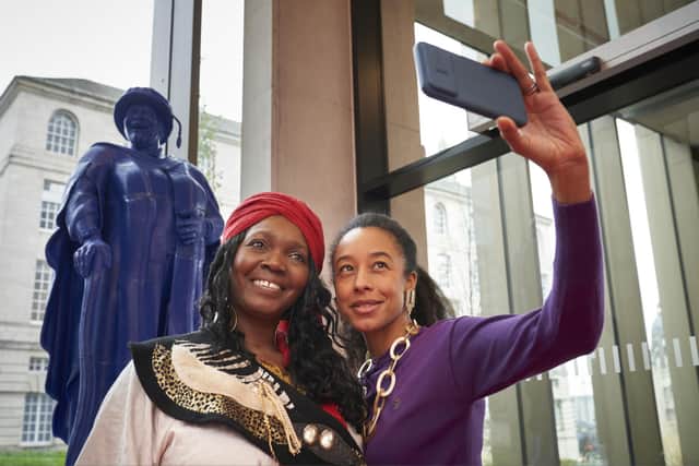 LBU PhD student Lara Rose (left) and Corrine Bailey Rae (right) in front of the Geraldine Connor statue in the Leeds School of Arts building. Picture: Justin Slee