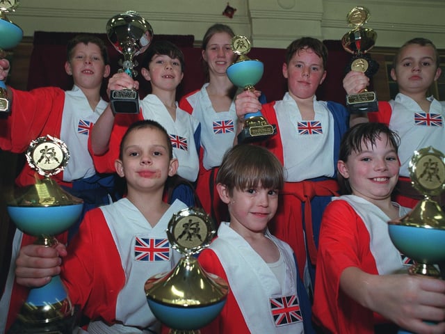 Members of the Yorksire Freestyle Martial Arts Club in Beeston pictured in  November 1998 having just returned from a world championship tournament in Holland  with seven trophies.
