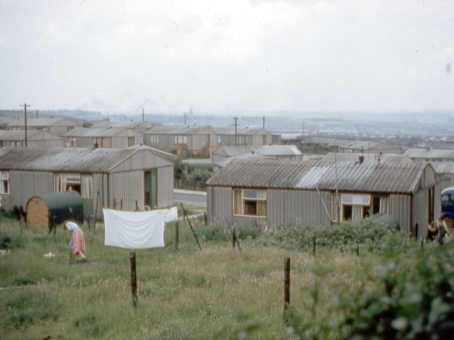 Pre-fabricated housing at the end of William Street in June 1960. Because of the war the building of the Hepworth estate was interrupted when only 58 houses had been completed and immediately after the war the remainder of the land was used to erect 40 "Arcon" type two bed-room prefabricated houses, as shown on the photograph.