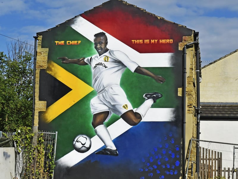 The 35ft mural is dedicated to Leeds United defensive rock and legend Lucas Radebe. The tribute to 'The Chief' is painted onto the side of the Sweeney Todd barbershop on Potternewton Lane, Chapel Allerton, where its owner became a friend to the player during his time at Leeds.