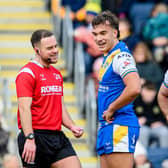 Referee Tom Grant with Leeds Rhinos' Presley Cassell and Jarrod O'Connor during last month's Cameron Smith testimonial game. Picture by Allan McKenzie/SWpix.com.