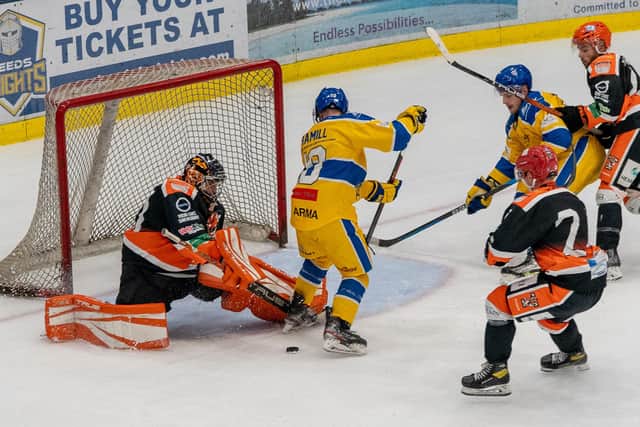 NOT THIS TIME: Telford Tigers' netminder Brad Day denies Leeds Knights' Carter Hamill during Saturday's NIHL National clash at Elland Road Ice Arena. Picture courtesy of Oliver Portamento