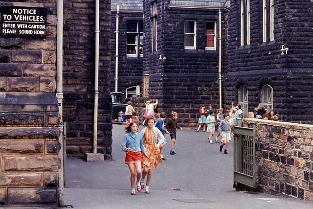 A back entrance to Peel Street Junior School on School Street in July 1965. Peel Street was Morley's first Board School and the architecture shown here is that of 1880. When first built the school had three separate sections - an infants section, a girls section and a boys section.
