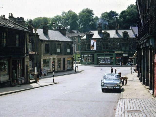 Looking into Morley Bottoms from the foot of the Club Field steps. The area at this time still had its long established and well respected retailers including R. A. B. Riley, A. Rogerson, W. Crosby, Misses Toulman and the Garden Centre, and had not felt the full effects of the newly growing supermarkets.