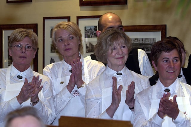 Waitresses applaud a speech by HRH The Prince of Wales during his visit to Bettys in February 2003.