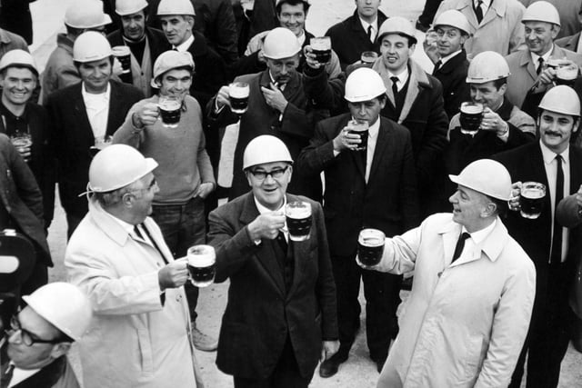 Drinking the traditional toast at the topping out of the new Yorkshire Evening Post building in 1970.  Pictured, front from left, are  Mr. J. J. G. Michie (managing director), John Laing (construction), Sir Kenneth Parkinson (chairman of Yorkshire Post Newspapers) and Mr. J. G. S. Linacre (managing director of Yorkshire Post Newspapers).