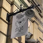 Below Stairs, located on South Parade, has a 4.8-star rating from 497 Google reviews.