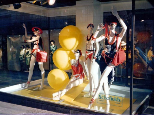 The windows of Schofield's department store in The Headrow showcasing summer fashions in swimwear. Schofield's closed in 1996 and the site was redeveloped as the Headrow Centre.