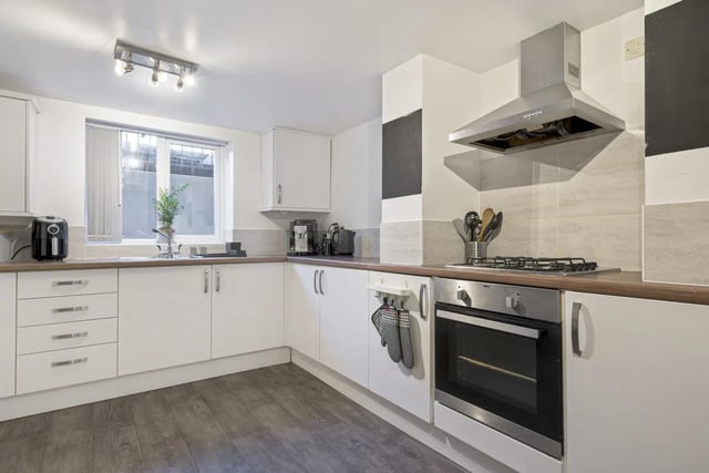 The kitchen has a gas hob with an electric oven and there is ample floorspace available for a large dining table.