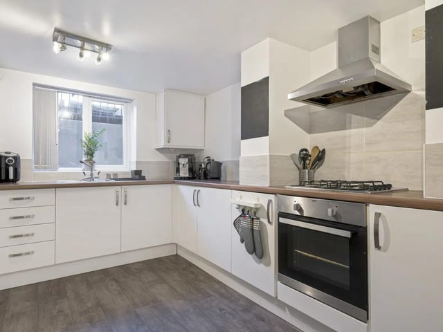 The kitchen has a gas hob with an electric oven and there is ample floorspace available for a large dining table.