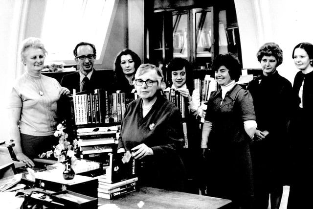 A photo to mark the retirement of Central Library staff member Mary Pedley, seen in the centre. Her brother Alan Pedley was a long serving member of Leeds City Council. This was taken in the Acquisitions department, where incoming new book stocks were processed. On the left is Marion Hartley, next Geoff Barrett, who was department manager. To the right of Miss Pedley is Barbara Hopper, then Maureen Hunter, then Josie Gooch.
