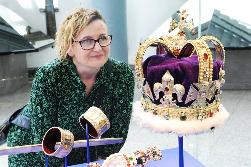 Clare Parslow gets a close look at the replica crown at the Royal Armouries.