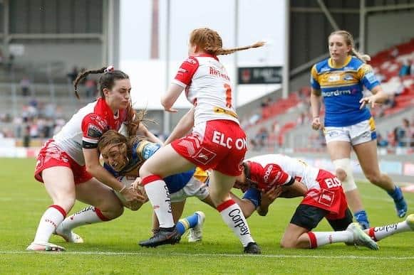 Caitlin Beevers looks on as Fran Goldthorp scores in Rhinos' dramatic win at Saints two months ago. Picture by Ed Sykes/SWpix.com.
