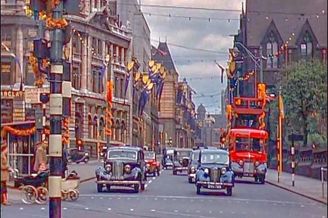 Looking north along Park Row from City Square, showing decorations in place to celebrate the coronation of Queen Elizabeth II.
