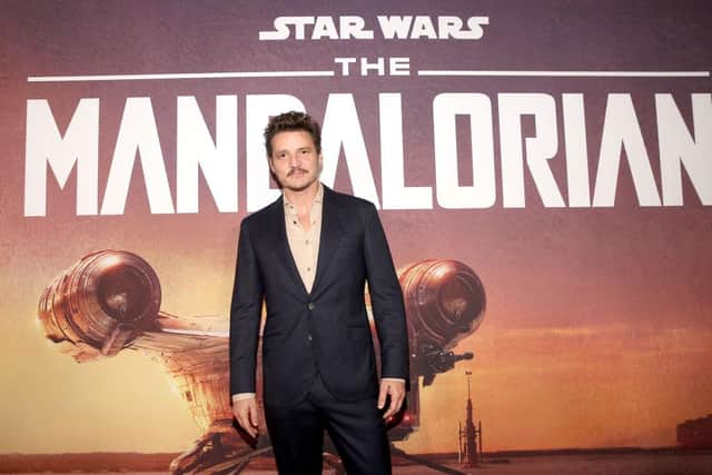 Pedro Pascal arrives at the premiere of Lucasfilm's first-ever, live-action series The Mandalorian in November 2019 (Photo: Jesse Grant/Getty Images for Disney)