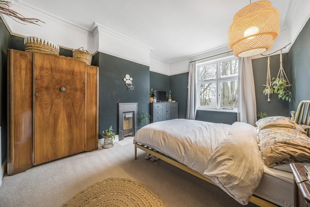 The main bedroom is above the living room and is a large, front-facing double bedroom with a lovely outlook over the woodland beyond the front garden. The bedroom has a cast-iron fire within the chimney.