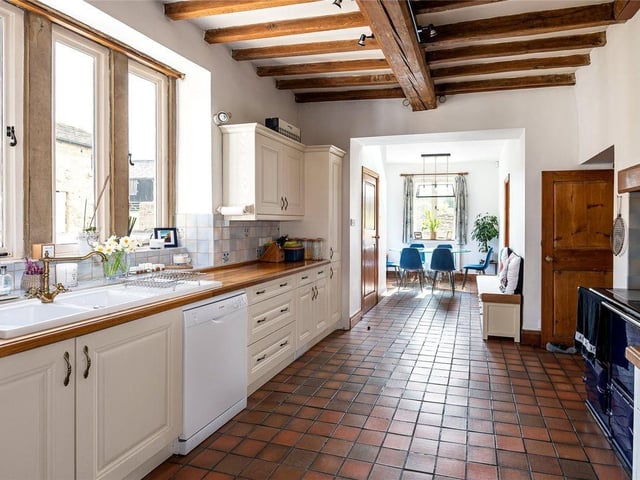 At the centre of this family home sits a farmhouse style breakfast kitchen which offers a range of solid wall and base units.