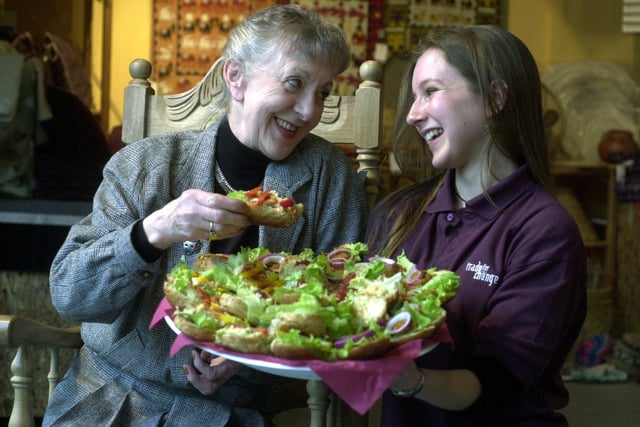Actress and organic food enthusiast Thelma Barlow enjoys a platter of organic food with organic gardener and shop co-ordinator Helen Stathers while visiting the Trade For Change shop in Leeds city centre.