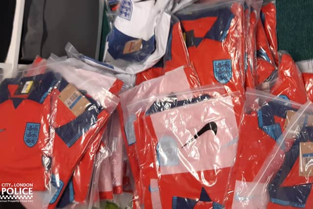 Four premises were raided in Leeds, with officers seizing a large quantity of fake England shirts. Picture: City of London Police