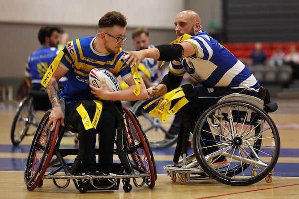 Rhinos' Josh Butler in action against Halifax Panthers' Jeremy Boursin earlier this season. Picture by John Clifton/SWpix.com.