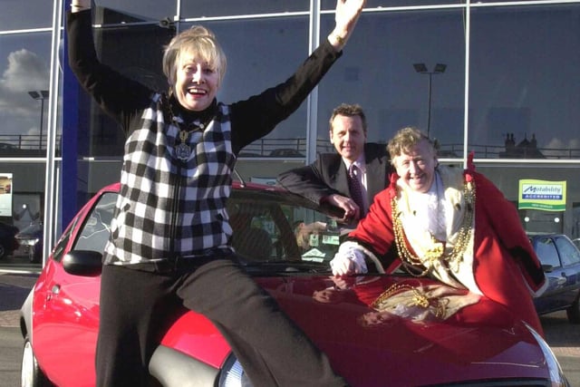 The Lady Mayoress of Leeds, Coronation Street actress Liz Dawn receives the keys for the Ford KA motor car at Benfield Ford, York Road, Leeds, watched by the Lord Mayor of Leeds Coun Bernard Atha and Ron Skinner, the divisional operations manager for Benfield Ford. The car has been donated by Benfield Ford for a raffle to raise funds for cancer charities.