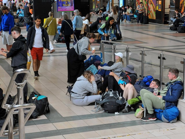 Leeds Festival fans arrive back in the city centre.
