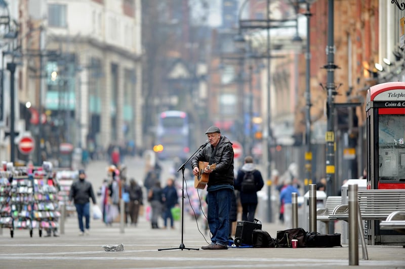 Briggate is full of shops and shoppers but it also frequented by buskers.