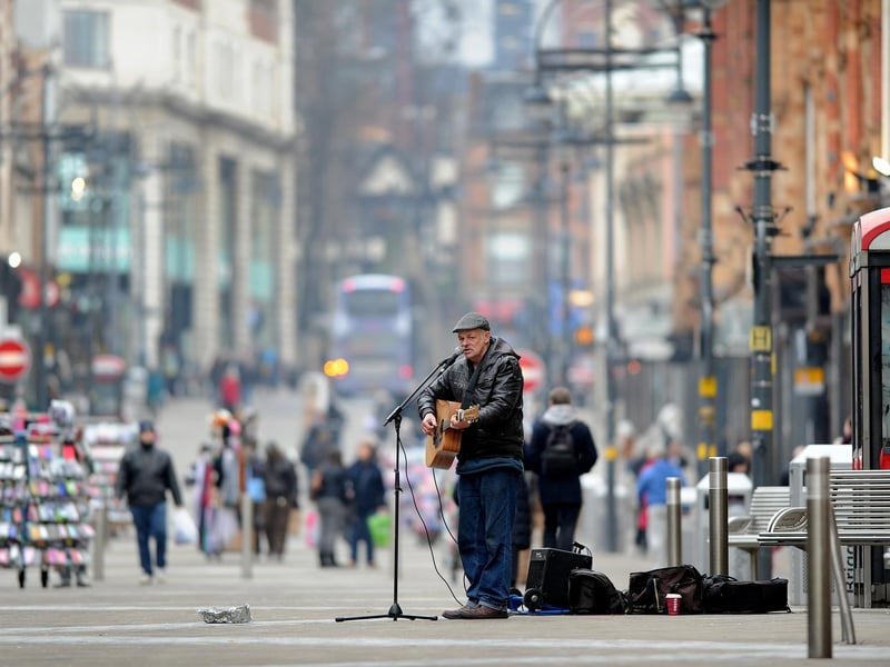 Briggate is full of shops and shoppers but it also frequented by buskers.