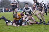 Jack Sykes scores for Stanningley in their Challenge Cup first round win against Dewsbury Moor last week. Picture by John Victor.
