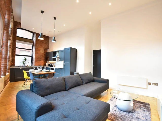 The apartment draws its allure from its modern interior and open plan design.