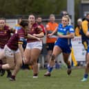 Bethan Dainton makes a break during Leeds Rhinos' win over Huddersfield Giants in this season's Betfred Women's Challenge Cup. Picture by John Victor.