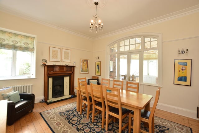 The second elegant reception room also has a fireplace and has potential to open up into the kitchen.