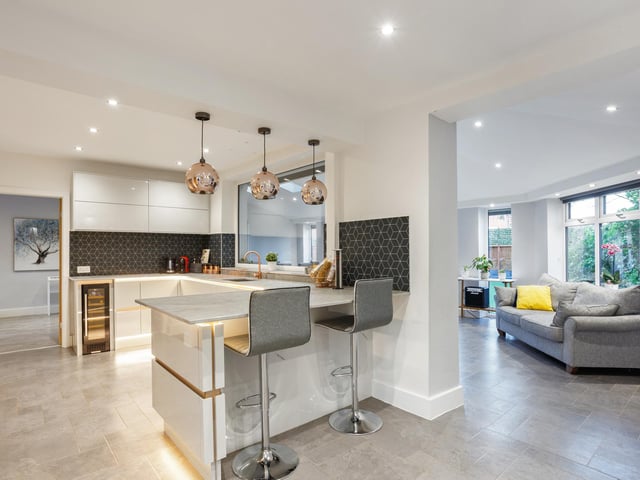 The ground floor is arranged in an open and sociable design with a fabulous kitchen and dining area featuring a number of integrated appliances including a wine cooler, mood lighting and a roof lantern providing excellent natural light.