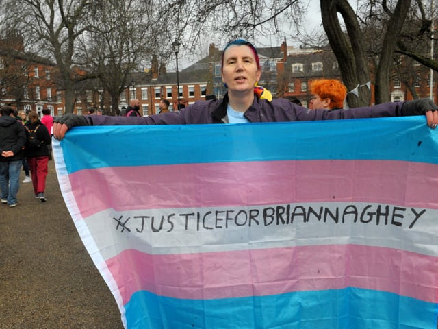A number of those in attendance carried flags and banners.