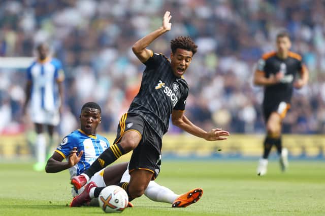 BRIGHTON, ENGLAND - AUGUST 27: Tyler Adams of Leeds United is tackled by Moises Caicedo of Brighton & Hove Albion during the Premier League match between Brighton & Hove Albion and Leeds United at American Express Community Stadium on August 27, 2022 in Brighton, England. (Photo by Bryn Lennon/Getty Images)