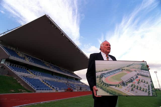Hunslet Hawks chairman Grahame Liles at South Leeds Stadium with an artist's impression of improvements which were designed to secure the club a Super League place in the 1990s.