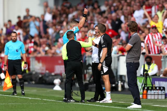OUT OF LINE: Leeds United boss Jesse Marsch is sent off by referee Robert Jones during Saturday's wild Premier League clash at Brentford as Bees boss Thomas Frank, right, looks on. Photo by Steve Bardens/Getty Images.