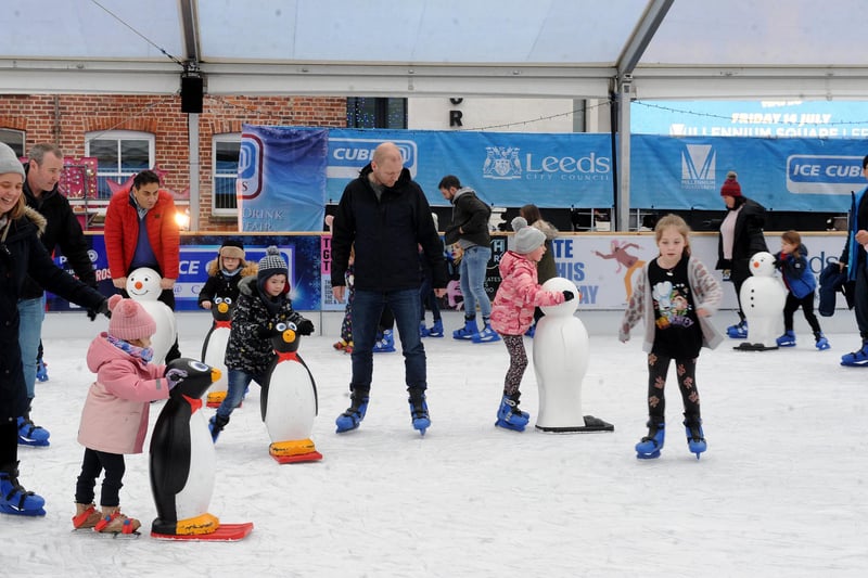 Families pictured enjoying a skate on the ice rink at Millennium Square.