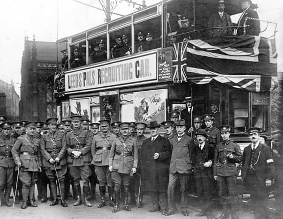 Lieutenant Colonel S.C. Taylor and officers of Leeds Pals stand in front of the decorated tram in the June of 1915. Over 800 recruits passed through the tram, the Leeds Pals recruited approximately 2,000 troops, the average age was 20/21.