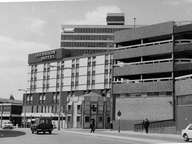 A view from Merrion Way circa 1967 showing The General Wade pub and Merrion Hotel. Several people are visible in the street and cars and a van can also be seen.